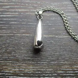Heart shaped hole memorial pendant