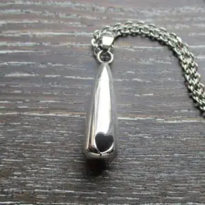 Heart shaped hole memorial pendant