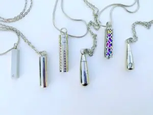 Larger capacity cremation pendants