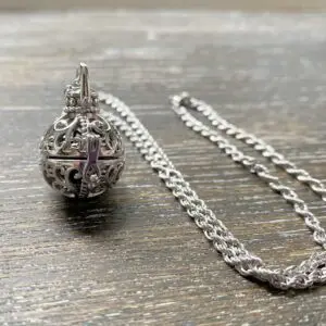 Vintage filigree ball urn memorial pendant