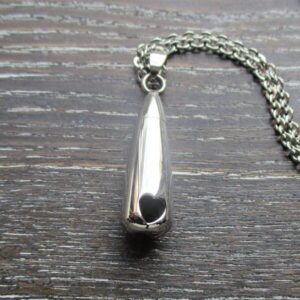 Heart shaped hole memorial pendant