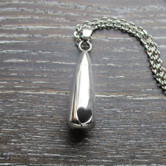 Heart shaped hole memorial pendant
