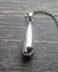 Heart shaped hole memorial pendant