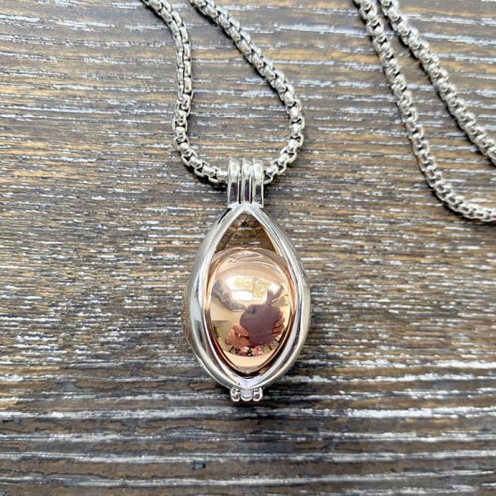 open teardrop with hollow ball memorial pendant