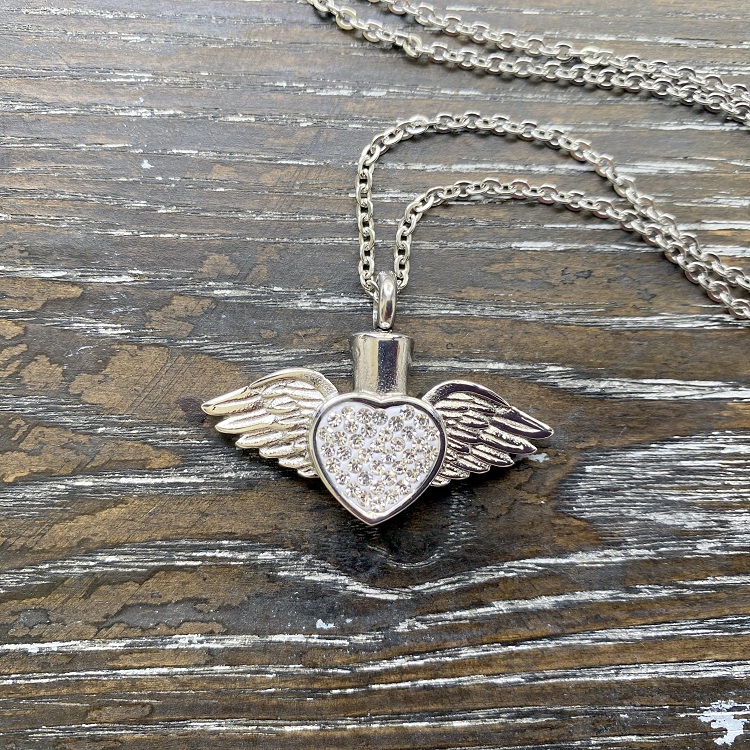 Angel wings with white crystal heart