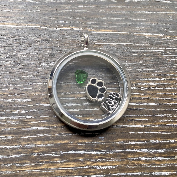 floating pendant with charms inside
