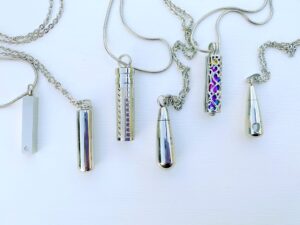 Larger capacity cremation pendants