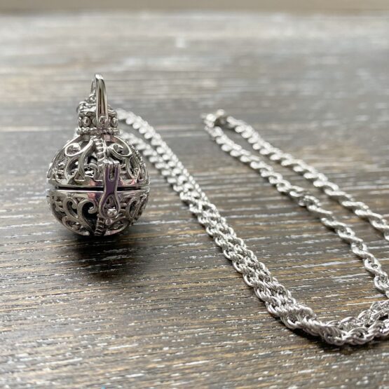 Vintage filigree ball urn memorial pendant