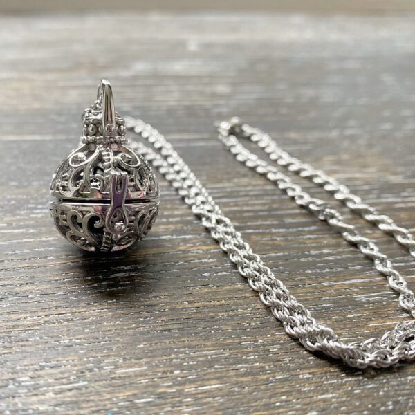 Vintage filigree ball urn memorial pendant