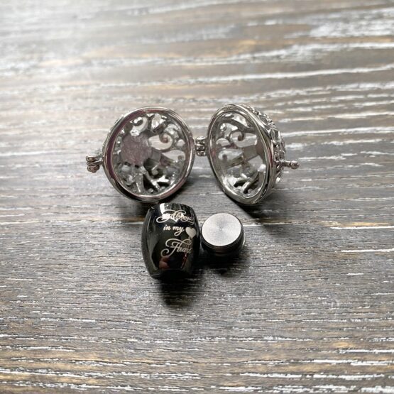 Vintage filigree ball with urn pendant open