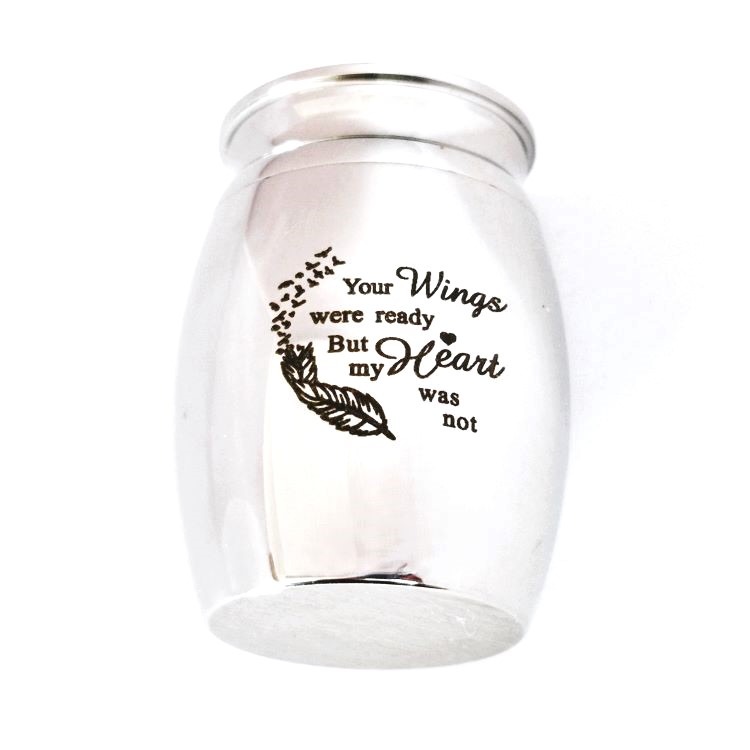 Urn with message 'Your wings were ready, my heart was not'