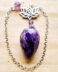 Amethyst faceted pendulum with Lotus charm
